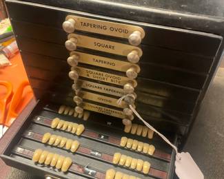 Sample false teeth in Bakelite case