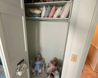 We had every corner we could, including this closet for all the very beautiful high-end dolls, and of course, up above decorative pillows!