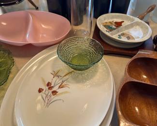 The two oval platters in the middle of the picture are made by Taylor Smith and Taylor! They were produced between 19 50 90, 1967 and the pattern is called Wind and Weather Autumn dinner platter!