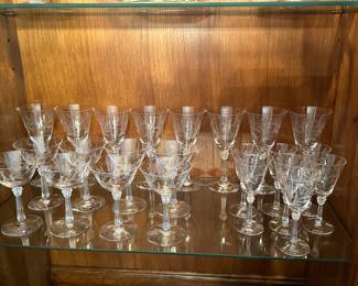 A beautiful set of etched crystal. Platters, Candelabras, bowls, and stemware!