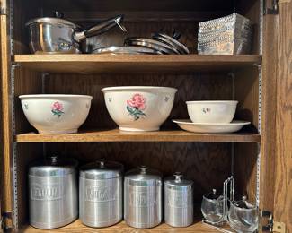 Here we have lots of vintage items. The top shelf is revere where the bottom shelf is fantastic brushed aluminum canisters.!