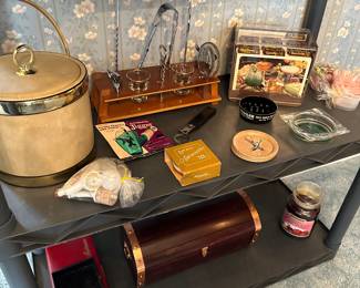 Here are two full shelves of vintage barware!