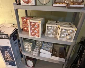 Here is a shelf filled with glass ornaments in the pastel color scheme!