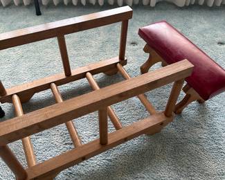 Here’s a very cool end of the bed, luggage rack, and a vintage kneeler for prayer