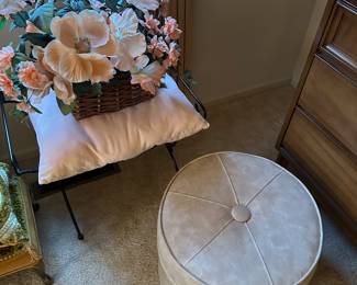 There’s a great vinyl stool and behind it is a small boudoir stool