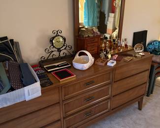 That is the wide, mid-century modern dresser with mirror