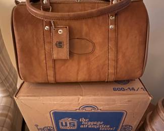 I opened the box that this suitcase is sitting on it is mint