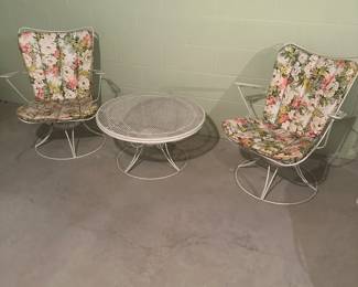 There is lots of outdoor tables and chairs and accessories