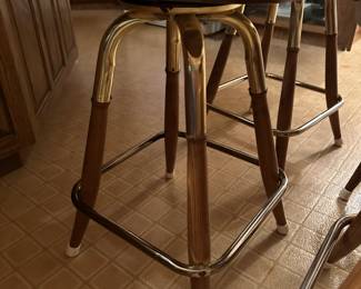The legs are wood and brass