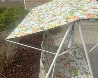 This is a fantastic mid-century modern two person swing! It is an excellent condition the cushion and the vinyl top are floral patterned! And you’ll notice under the seat is an extra cushion!