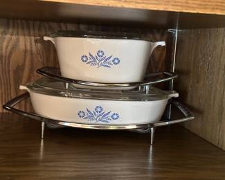 Two more little casserole, dishes with the cool vintage trays and handles