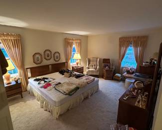 The master bedroom is massive and is filled with impeccable, mid-century modern furniture