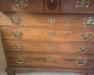 This Thomasville piece has five drawers at the bottom all with the original pulls