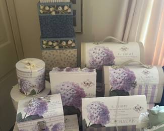 This is a massive collection of lilac boxes and stackable’s and behind it in the corner is another collection of stackable!
