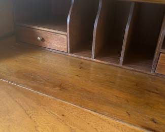 Inside the secretary, are slots and drawers for your home office work