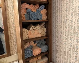 These towels are all matching sets are in excellent condition! Down to lower left of the picture is a vintage set of days of the week, hand towels!