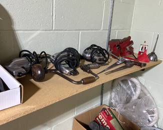 Nice little tool room! Ladders, tools and more!