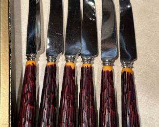 Here is another set of vintage butter knives!