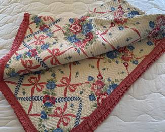 This is one of two very cool vintage quilts