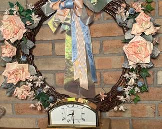 A nice spring wreath with a Howard Miller clock! The clock works perfectly with Westminster chimes!