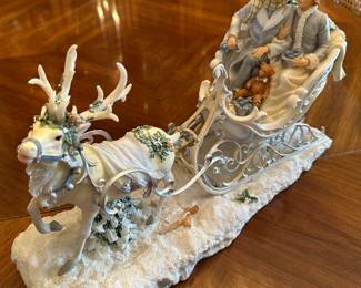 This is a lovely centerpiece of a Victorian couple on a sleigh ride!