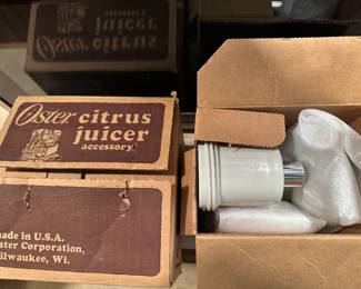 Here are two more attachments in their original boxes, the citrus juicer, and the meat grinder!