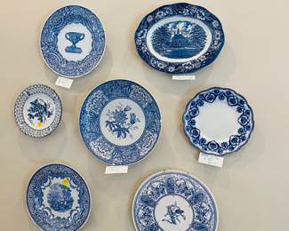 A assorted blue and white plates as well as transfer ware