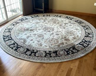 Round black and Cream Rug 98" dia clean and ready to go. 