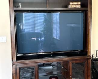  $75Entertainment Center 60.5"Wx63"Hx19"D . TV is a Panasonic TV60".  145 