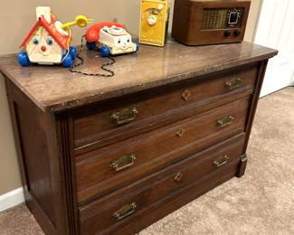$85 Nice antique dresser with marble top. No issures. Drawers work well, or as well as the did in theres dressers. very nice piece. 