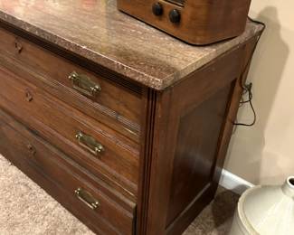 $85 Nice antique dresser/ buffet with marble top. No issures. Drawers work well, or as well as the did in theres dressers. very nice piece. 