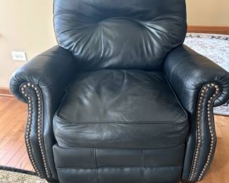 $155 Leather Recliner, comfy tv (sleeeping) chair. Love the studs on the arms. Clean, no damage. Looks boue in photo but it is back