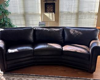 The sofa is dark brown. Shows little to no signs of wear. No tears. This sofa is marked $550