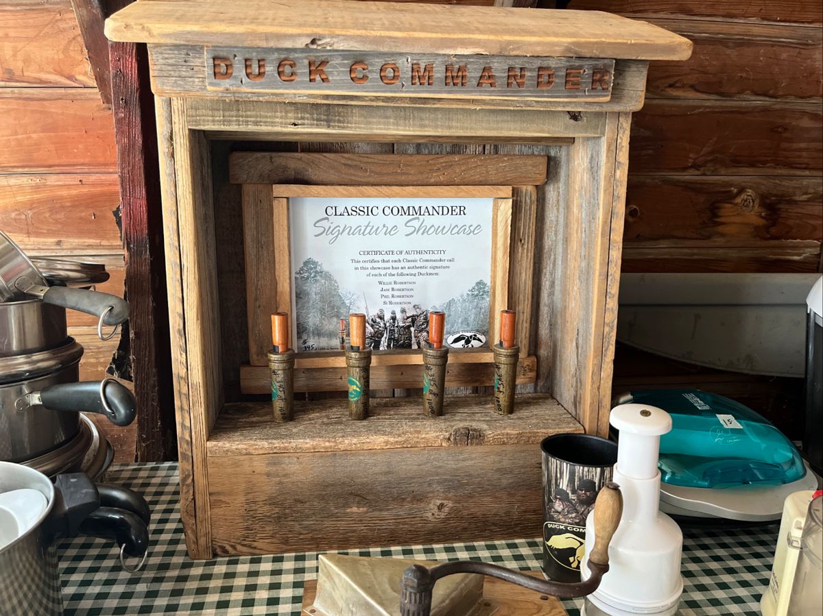Duck Dynasty display with signed duck calls