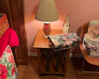 Table with lamp and curtains on top