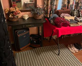 Vanity, mirror, and flowers 