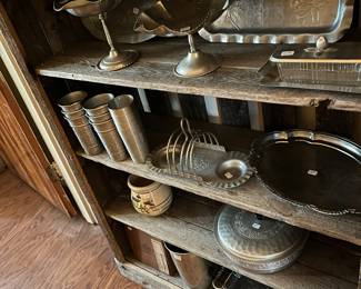 Hammered aluminum on a barnwood shelf 