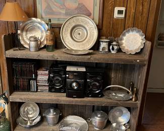 More hammered aluminum on a barnwood shelf 

Sony stereo
