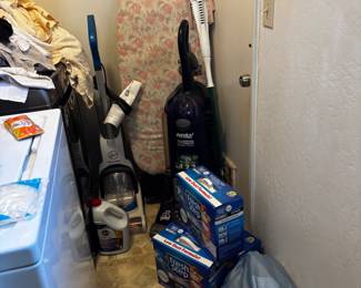 iron board, vacuum rug cleaner 