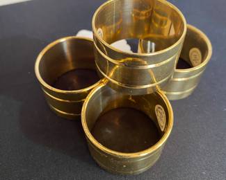 Brass napkin rings.