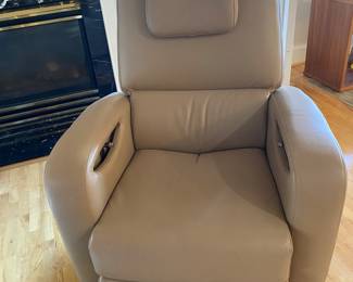 Leather recliner glider. You can sleep like a baby in it!