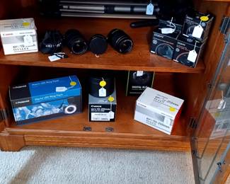 Cameras, lenses and supplies for personal or professional use