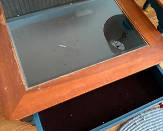 Coffee table with display drawer