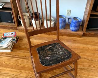 Antique rocker with leather seat