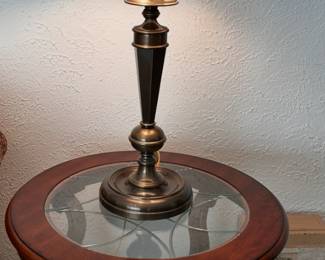 round end table with cut glass top, heavy brass lamp