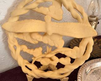 carved coral art on stand, from Hawaii