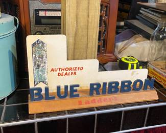 Blue Ribbon ladders sign 