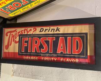 Framed First Aid soda advertisement 
