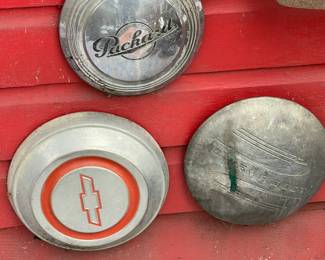 Packard and Chevy hubcaps 