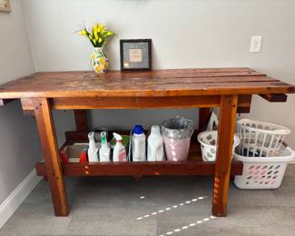 WOODEN TABLE USED FOR LAUNDRY FOLDING